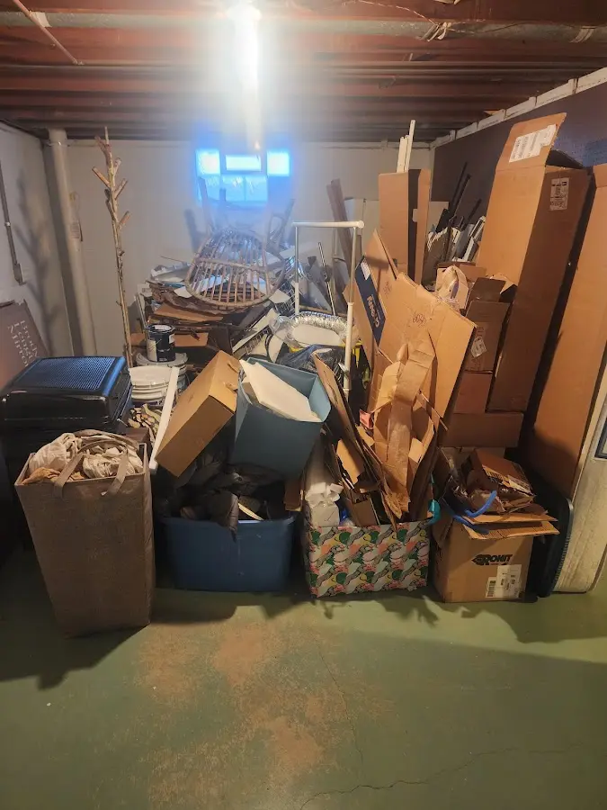 Roll-off dumpster container at job site for Construction Dumpster Rental in Freeport